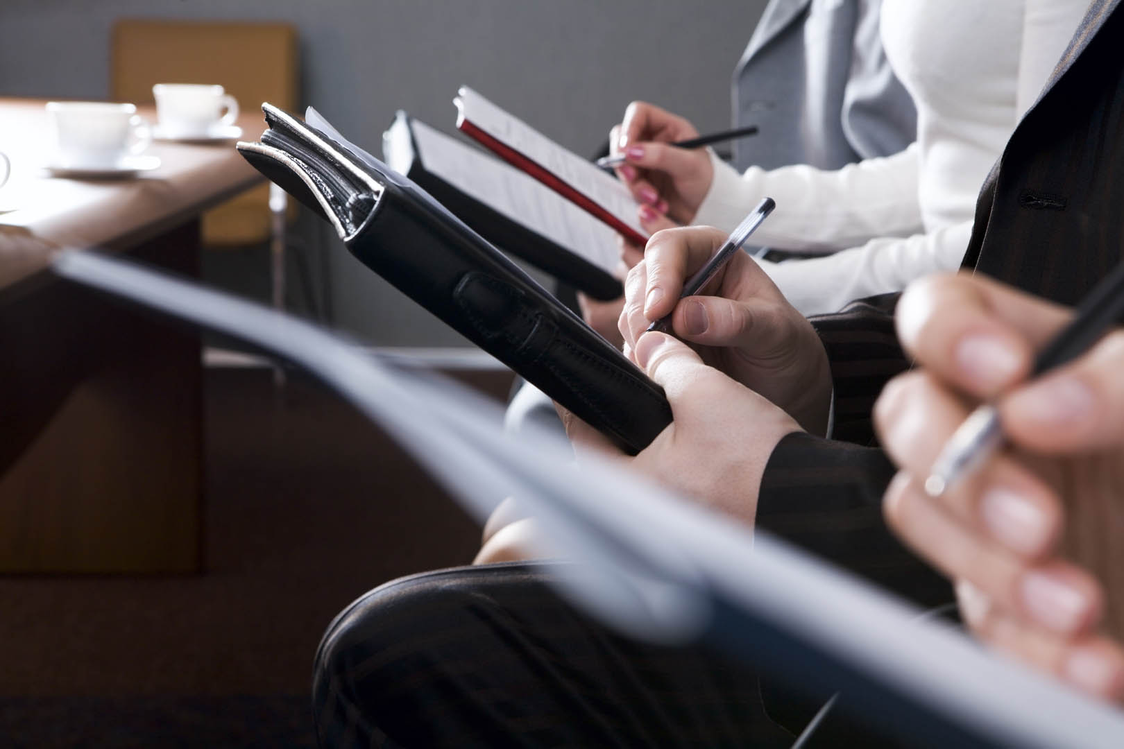 office-taking-notes